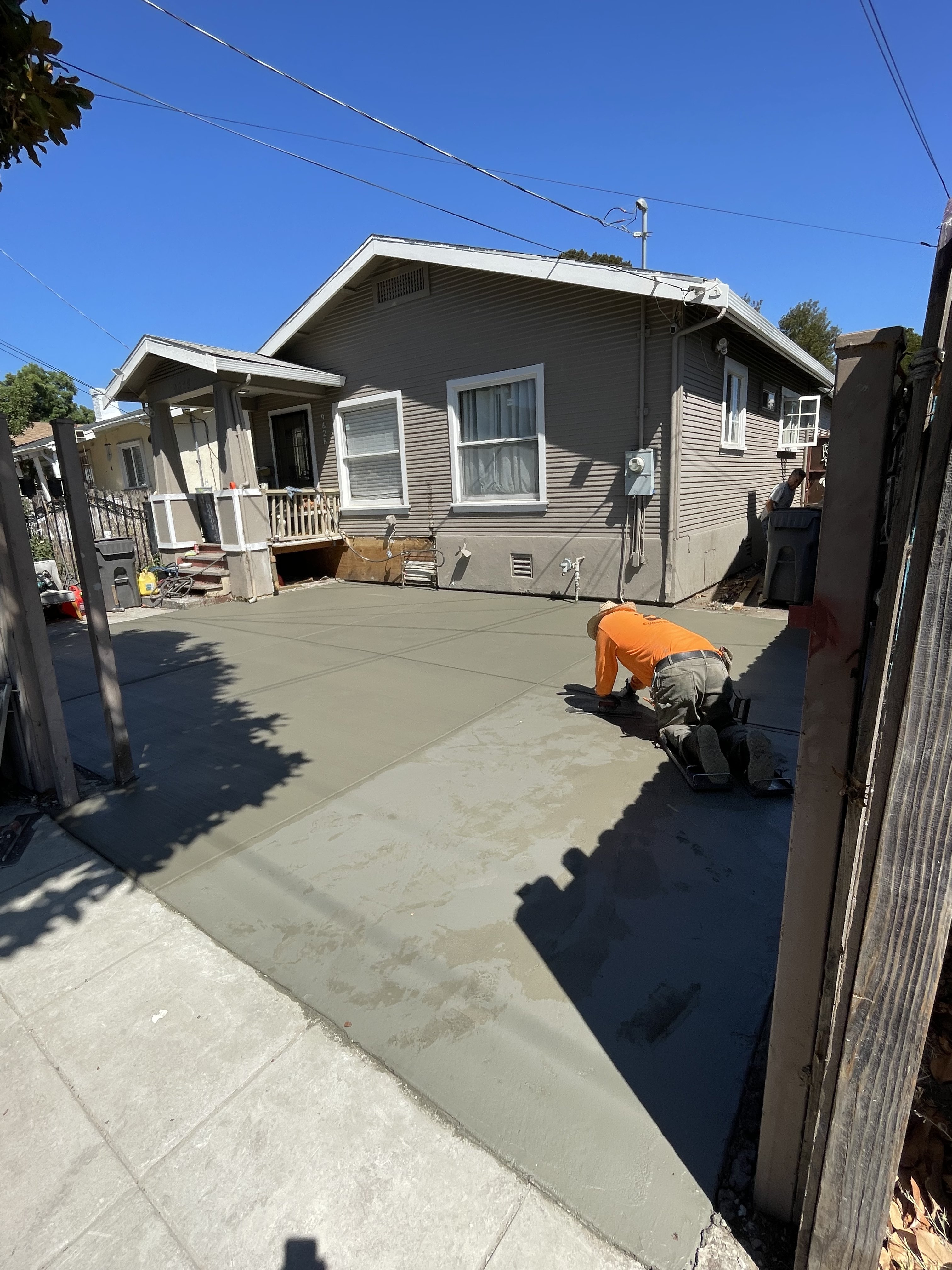 BlackHawk crew finishing concrete driveway in East Bay