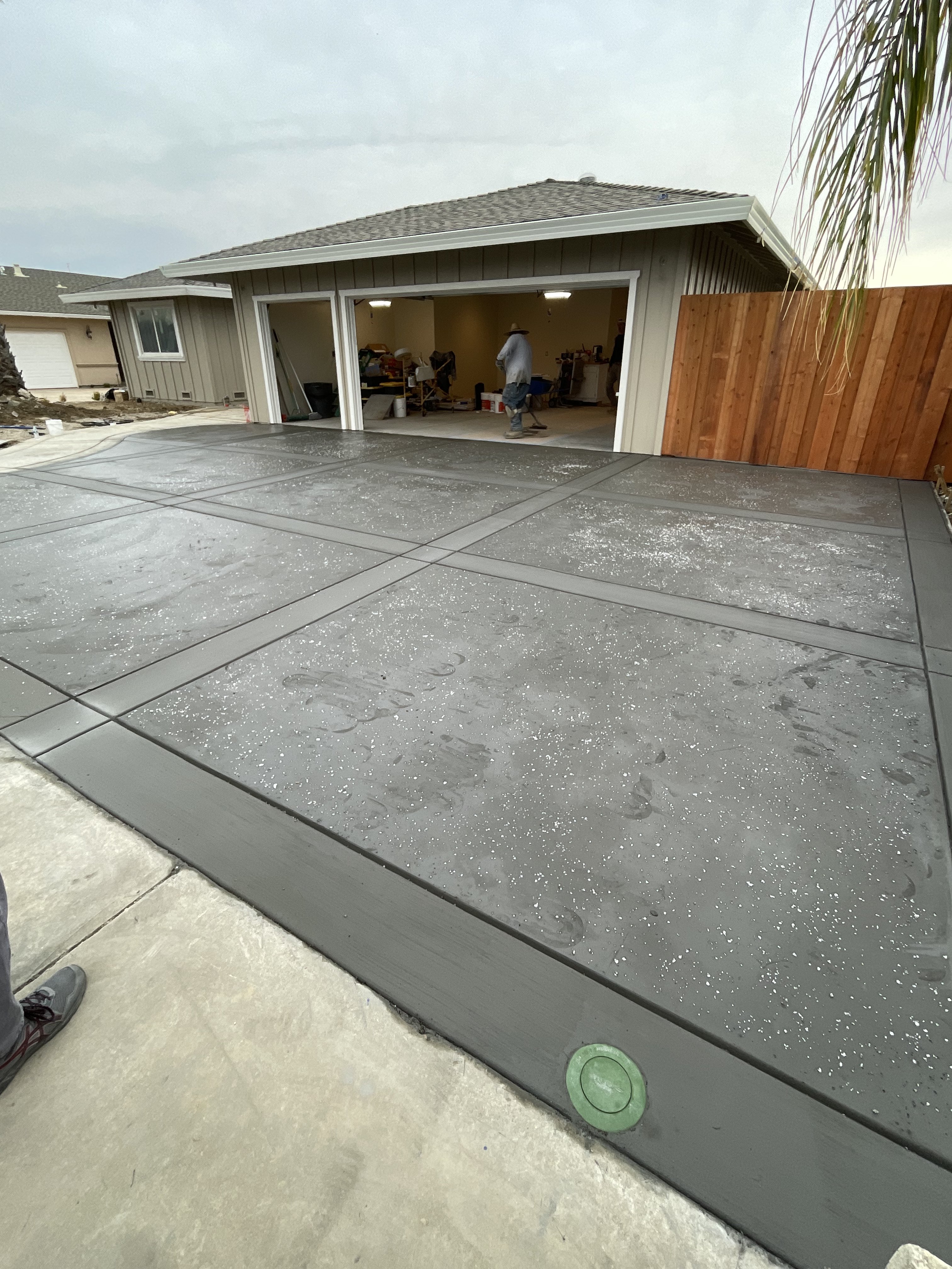 Epoxy coated driveway by BlackHawk Landscaping East Bay