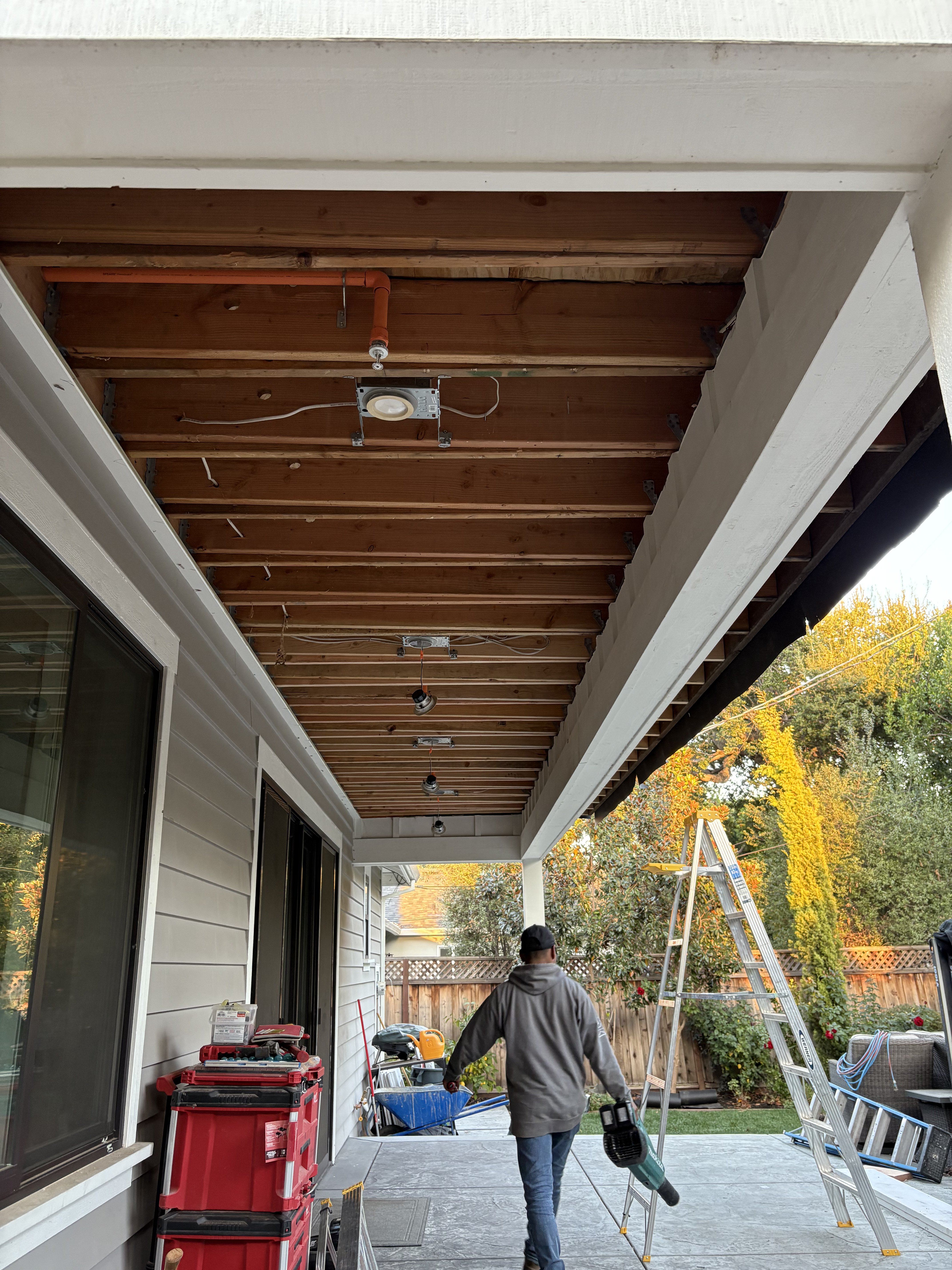 Pergola patio cover under construction by BlackHawk Landscaping